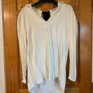 Just Fab cream blouse with black tie in the back.